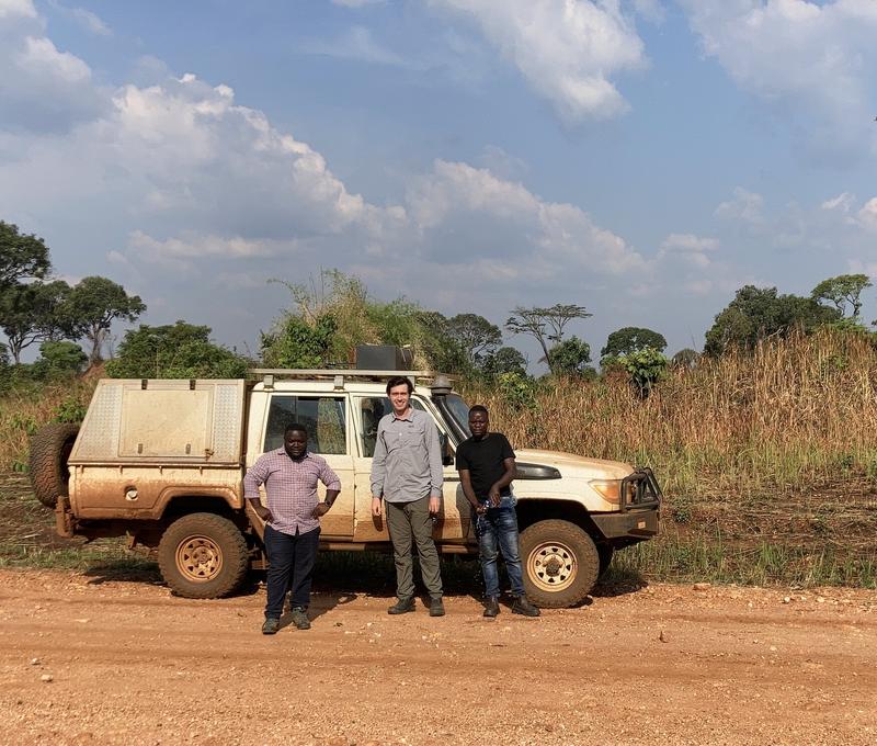 Dr Tobermory Mackay-Champion standing with Mr Sekelo Mutelekesha and the driver from First Quantum Minerals Ltd