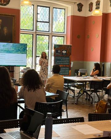 Dr Caitlin McElroy presenting at London Climate Action Week